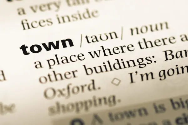 Close up of old English dictionary page with word town — Stock Photo, Image