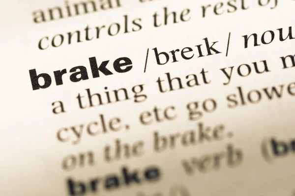 Close up of old English dictionary page with word brake — Stock Photo, Image