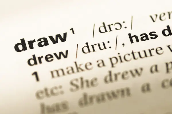 Close up of old English dictionary page with word draw — Stock Photo, Image
