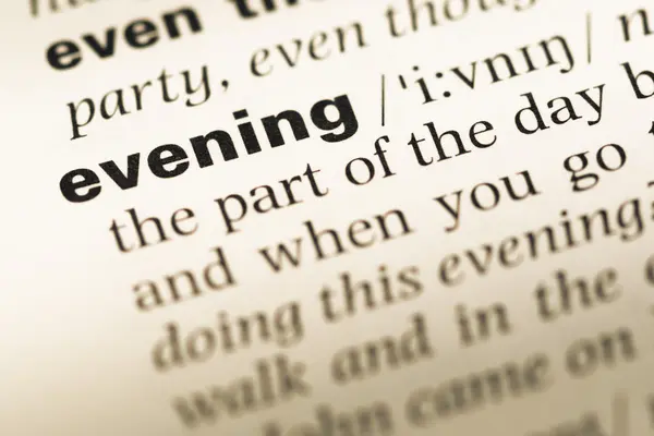 Close up of old English dictionary page with word evening — Stock Photo, Image