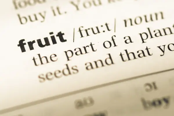 Close up of old English dictionary page with word fruit — Stock Photo, Image
