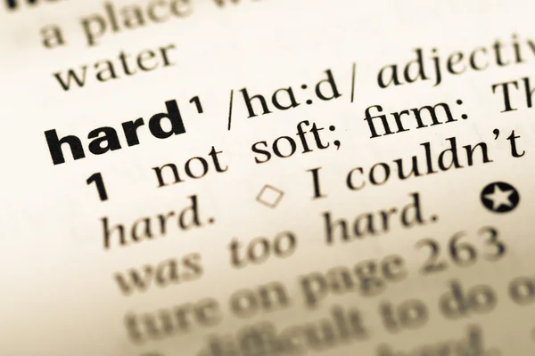 Close up of old English dictionary page with word hard — Stock Photo, Image