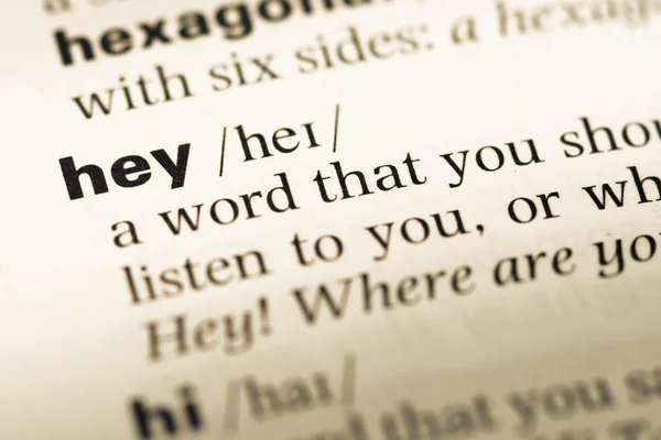 Primer plano de la página del diccionario inglés antiguo con word hey —  Fotos de Stock