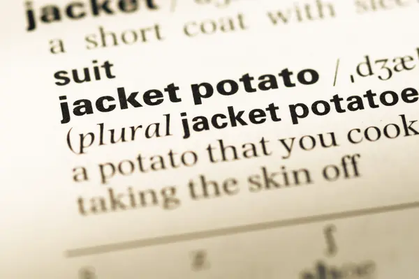 오래 된 영어 사전 페이지 word 재킷 감자의 클로즈업 — 스톡 사진