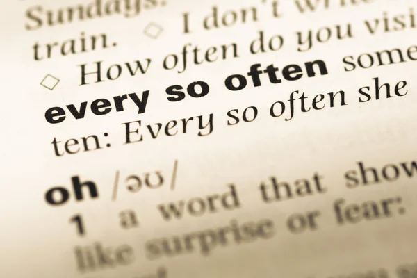 Close up of old English dictionary page with word every so often — Stock Photo, Image