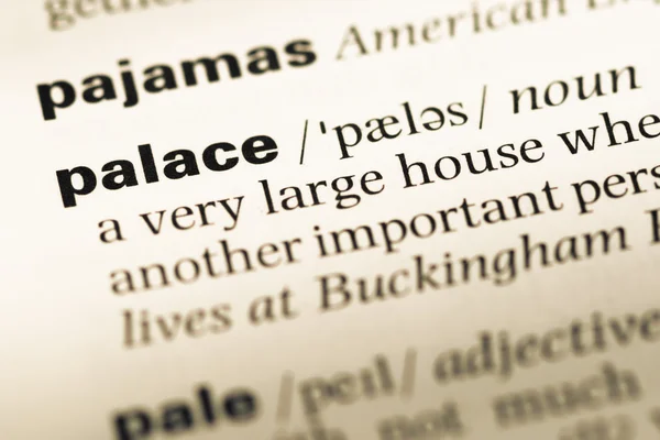 Close up of old English dictionary page with word palace — Stock Photo, Image