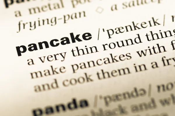 단어 팬케이크와 오래 된 영어 사전 페이지 닫습니다 — 스톡 사진