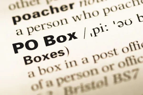 Close up of old English dictionary page with word po box — Stock Photo, Image