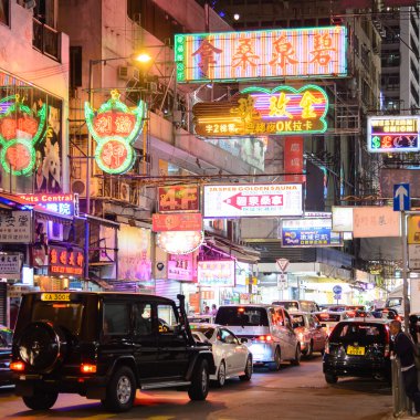 HONG KONG , CHINA - AUG. 17 : Mongkok at night on Aug 17, 2013 in Hong Kong, China. Mongkok in Kowloon is one of the most neon-lighted place in the world and is full of ads of different companies.