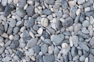 Kuru yuvarlak yeniden işlenebilir taşlarla soyut arkaplan