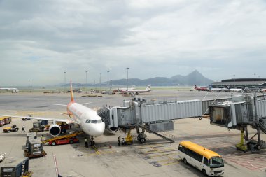 HONG KONG - MAY 16: Cargoes being unloaded from a Hong Kong Airlines at Hong Kong airport on May 16, 2014 in Hong Kong. Aside from China Airlines, Hong Kong Airlines is one of the most busy carriers in the region.