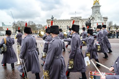 LONDON - APR 15: The changing of the guard ceremony at Buckingham Palace on April 15th, 2013 in London, UK. It is one of England's most popular visitor attractions.