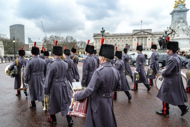 LONDON - APR 15: The changing of the guard ceremony at Buckingham Palace on April 15th, 2013 in London, UK. It is one of England's most popular visitor attractions.