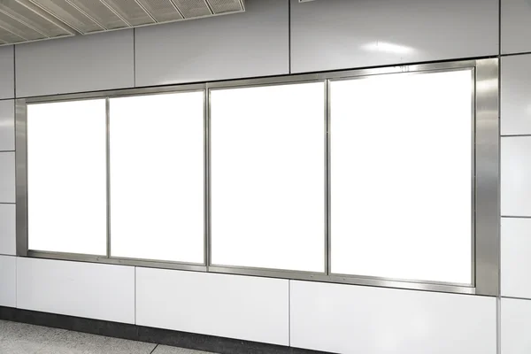 Four big vertical / portrait orientation blank billboard in publ