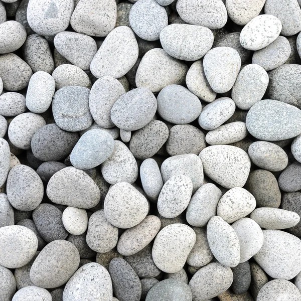 Naturligt polerad vit vaggar stenar bakgrund — Stockfoto