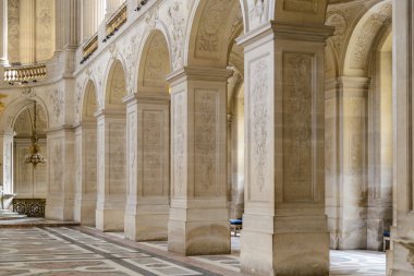 VERSAILLES, FRANCE - JUNE 19, 2013: Interior of Chateau de Versailles (Palace of Versailles) near Paris on June 19, 2013, France. Versailles palace is in UNESCO World Heritage Site list since 1979. clipart