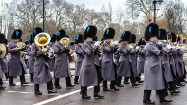 LONDON - APR 15: The changing of the guard ceremony at Buckingham Palace on April 15th, 2013 in London, UK. It is one of England's most popular visitor attractions.