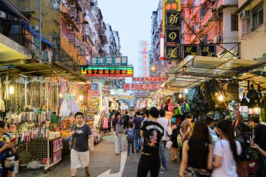 HONG KONG , CHINA - AUG. 17 : Mongkok at night on Aug 17, 2013 in Hong Kong, China. Mongkok in Kowloon is one of the most neon-lighted place in the world and is full of ads of different companies.