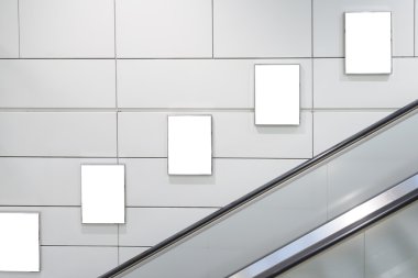 Five big vertical / portrait orientation blank billboard with escalator background