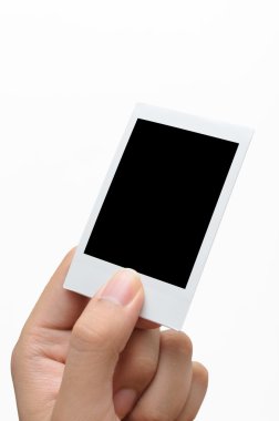 Kişi an fotoğraf beyaz arka plan üzerinde tutan el gitti