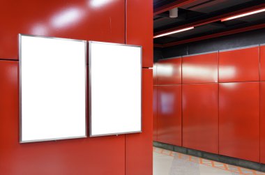 Two big vertical / portrait orientation blank billboard on modern red wall