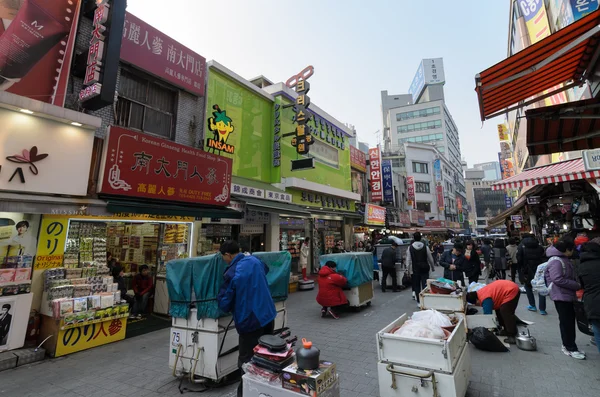 Street view of Nam Dae Mun Market, crowd present, on April 23 2013, Seoul, South Korea. This is the oldest, dates back to 1414, and largest traditional market in South Korea.