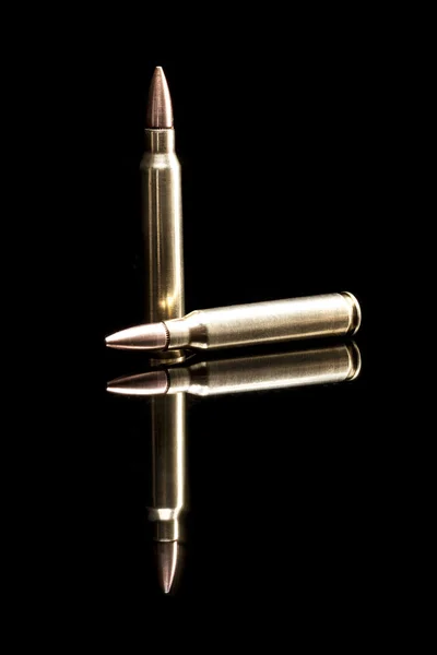 Two Gold Bullets Royalty Free Stock Photos