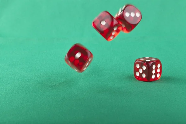 Bouncing Dice on Green — Stock Photo, Image