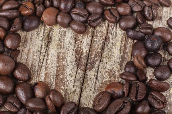 Kaffeeherz auf Holz — Stockfoto