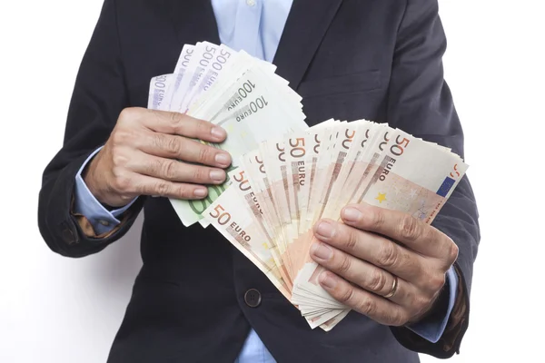 Holding Euros In Both Hands — Stock Photo, Image