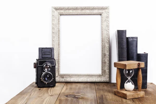 Kum saati ile gümüş çerçeve