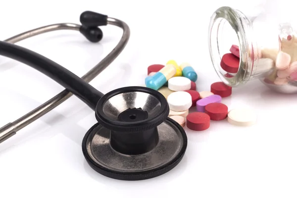 Black Stethoscope and Pills — Stock Photo, Image