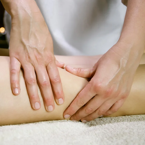 Closeup of legs massage in spa salon — Stock Photo, Image