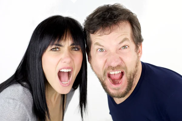 Unhappy angry couple screaming strong. — Stock Photo, Image