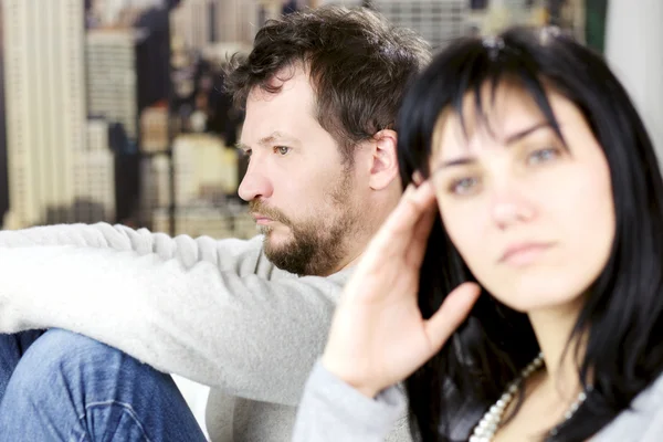 Depressed man not looking at wife after fight — Stock Photo, Image