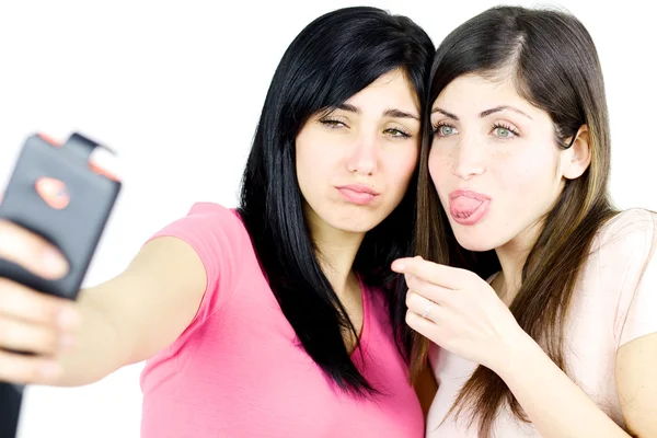 Girls making funny faces taking selfie — Stock Photo, Image