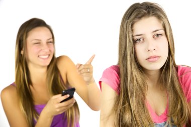 Female teenager sad about being laughed at clipart