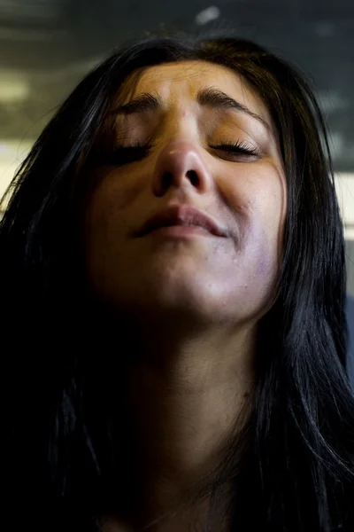 Woman with bruises in face crying on street at night closeup — Stock Photo, Image