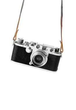 Vintage camera hanging in the straps clipart