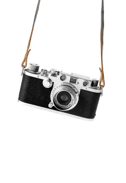 Askıları içinde asılı vintage fotoğraf makinesi — Stok fotoğraf