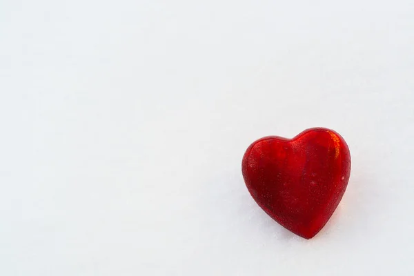 Red heart in the snow — Stock Photo, Image