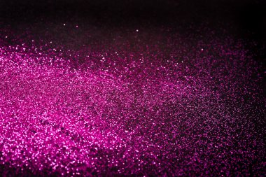 Siyah backgrund ile kopya alanı üzerinde pembe glitter