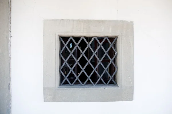 Old metal fence of building of the windows in Vinci ,italy — Stock Photo, Image