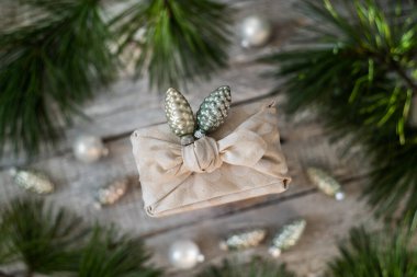 Furoshiki fabric gift wrapping. Christmas and New Year background. 