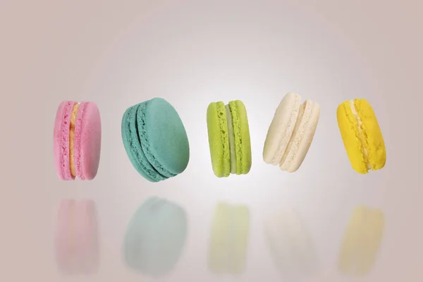 Colorful Macaroons Floating Row Reflextions Soft Color Background Levitation Food — Stock Photo, Image