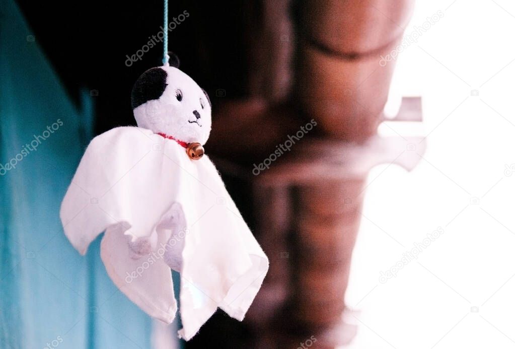 Japanese Rain Doll - Teru Teru Bozu - hanging under roof