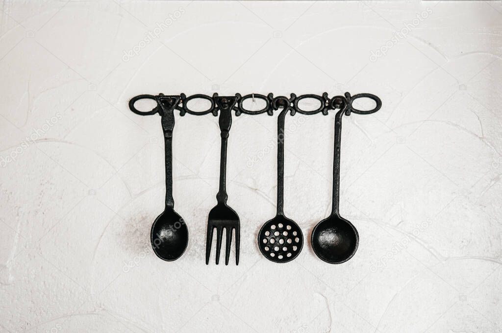 Old kitchen cutlery, silverware, restaurant decoration with vintage antique kitchen tools