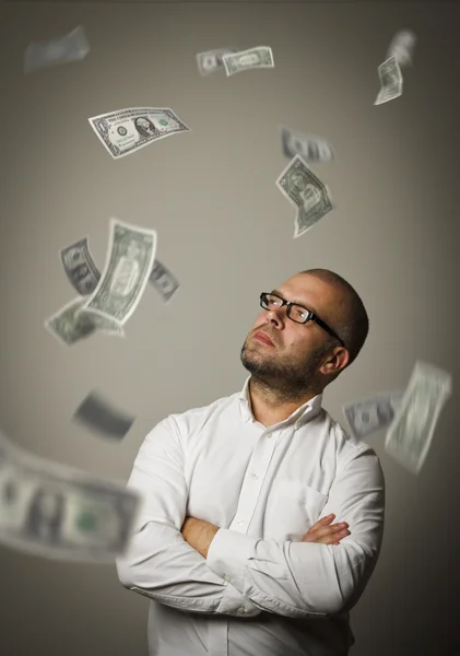 Hombre en blanco y dólares — Foto de Stock