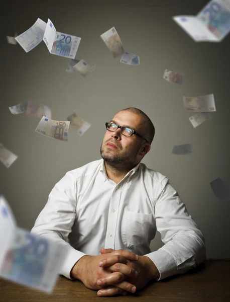 Homem de branco e euro — Fotografia de Stock