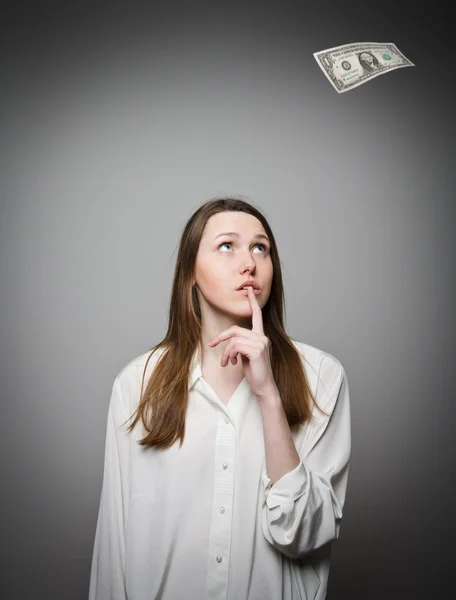 Fille en blanc et un dollar . — Photo